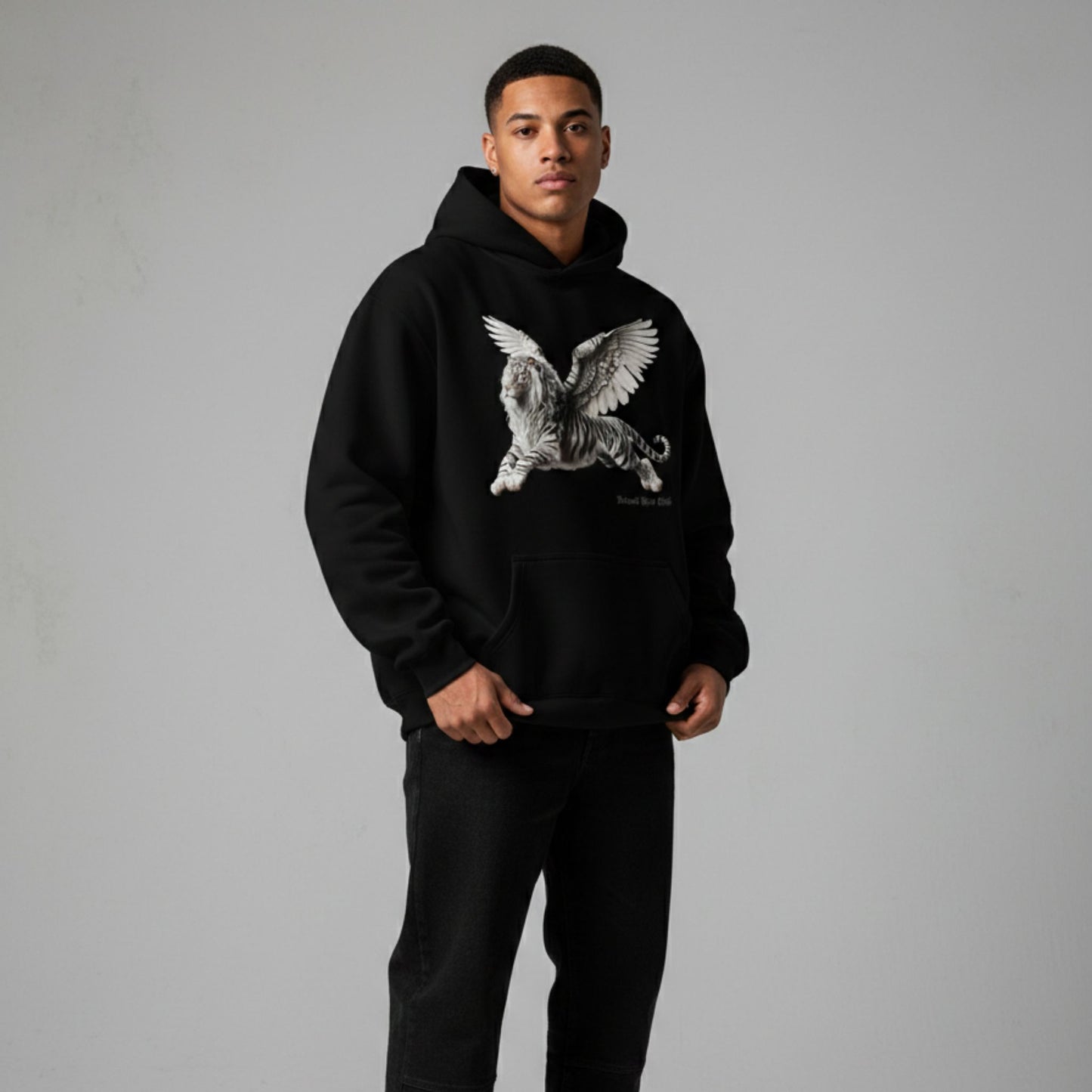 Detroit Riot Club Aether Liger Hoodie in Void Black, 9.4oz heavyweight hardware, male model front view, hood off full silhouette, premium streetwear.