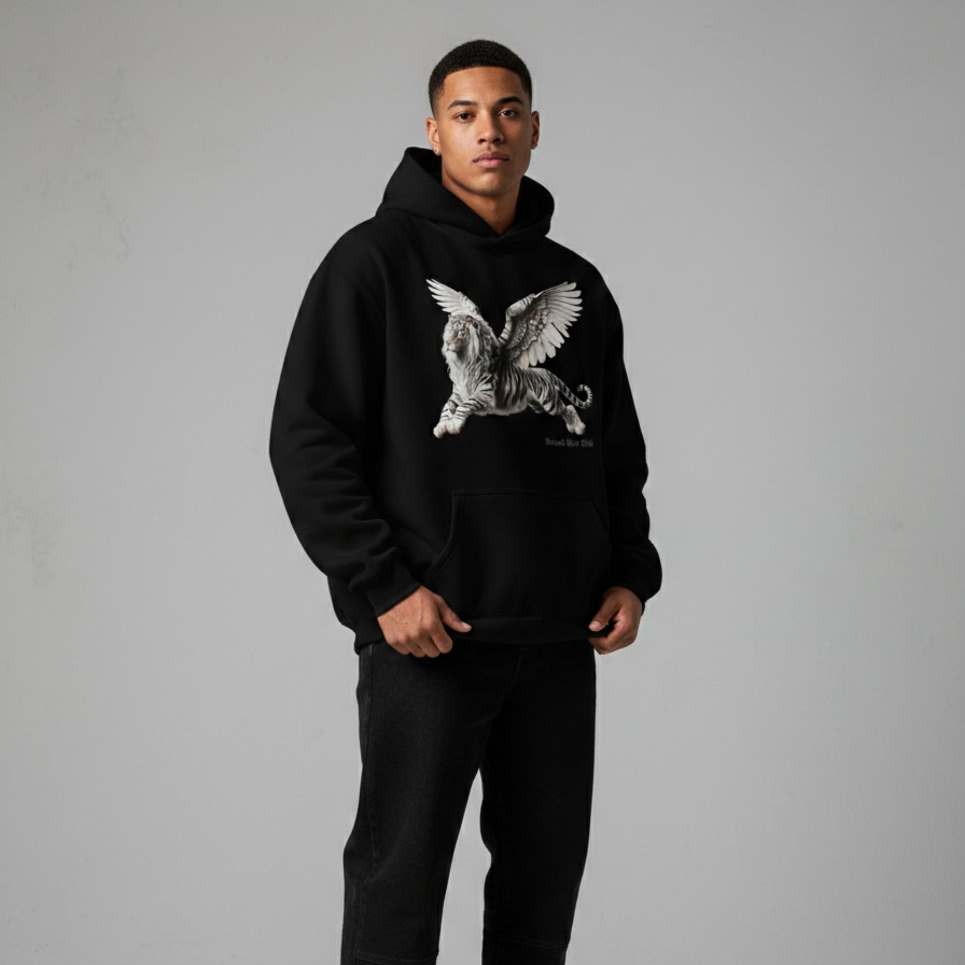 Detroit Riot Club Aether Liger Hoodie in Void Black, 9.4oz heavyweight hardware, male model front view, hood off full silhouette, premium streetwear.