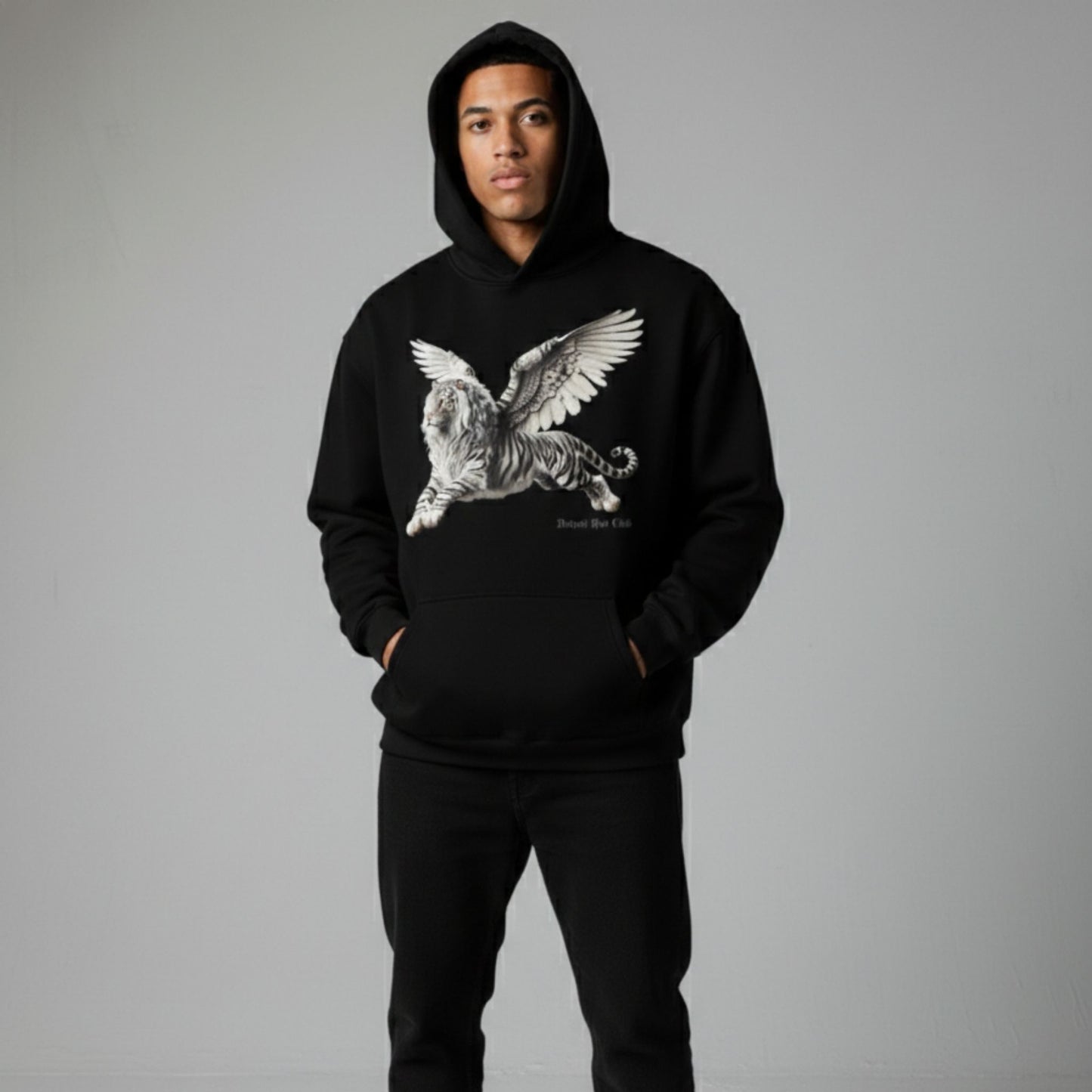 Detroit Riot Club Aether Liger Hoodie in Void Black, 9.4oz heavyweight hardware, male model front view, wearing hood full silhouette premium streetwear